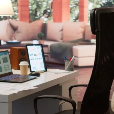 Empty modern home workstation of an entrepreneur with laptop and tablet
