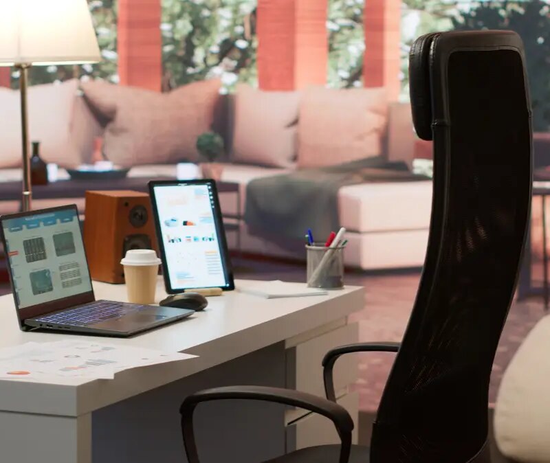 Empty modern home workstation of an entrepreneur with laptop and tablet